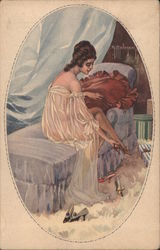 Woman on lounge chair in sheer lingerie, trying on shoes Postcard