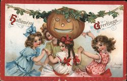 4 girls dancing around a pumpkin on a vine Halloween Postcard Postcard Postcard