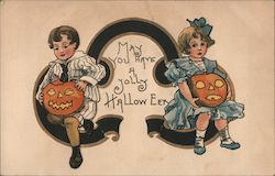 May You Have A Jolly Halloween - Girl and Boy Holding Jack-O-Lanterns Postcard Postcard Postcard