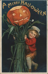 Child with Jack-o-Lantern on Stalks of Grass, A Merry Halloween Postcard