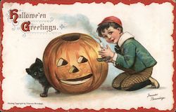 Boy Putting Candle in Jack O'Lantern: Hallowe'en Greetings Halloween Postcard Postcard Postcard