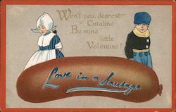 Love in a Sausage A girl and boy and a sausage Postcard