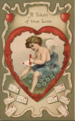 Cupid writing letters: "A token of true love" Postcard Postcard Postcard