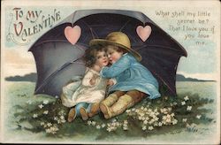 Children sitting underneath an umbrella in a field of flowers Postcard