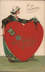 To my Valentine Woman Holding large heart with writing Postcard