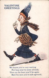 Woman wearing a hat and fur stole holding a fur coat Postcard