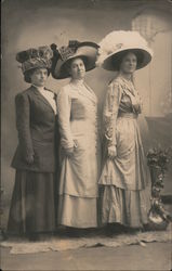 3 women in dresses and hats Postcard