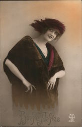 A woman wearing a burgundy feather hat and a fur jacket Hats Postcard Postcard Postcard