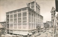 Large Building on Busy City Street Postcard