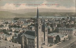 General view of Oakland, California, Lake Merritt in the distance Postcard