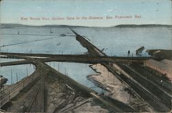 Key Route Pier, Golden Gate in the distance. San Francisco Bay Postcard