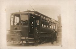 Two Men Standing By Streetcars Postcard