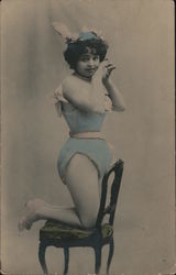 Woman in light blue bathing suit Postcard