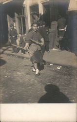 A Man Walking Down the Street with Two Swords San Francisco, CA Postcard Postcard Postcard