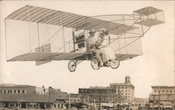 A Man and a Woman Posing on an Airplane San Francisco, CA Postcard Postcard Postcard