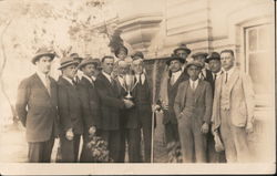 A Group of Men Holding a Large Silver Cup Postcard