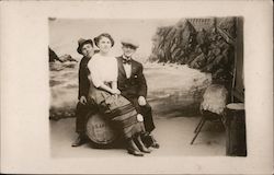 A Woman and Two Men Sitting on a Barrel San Francisco, CA Postcard Postcard Postcard