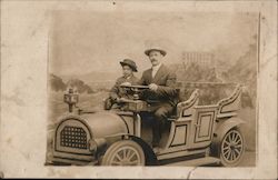 Man and Boy posing in Car in front of Cliff House picture Postcard