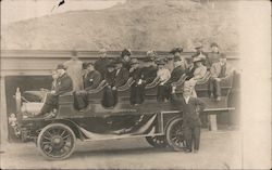 Several People in a Large Car Postcard