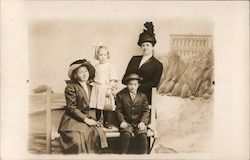 Two women, a young girl and boy pose in front of Cliff House Picture San Francisco, CA Postcard Postcard Postcard