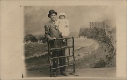 Man and young girl pose in front of Cliff House picture Postcard