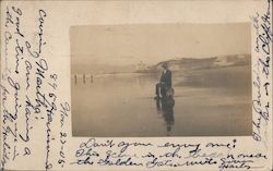 Cliff House A Man Sitting on a Barrel on the Beach San Francisco, CA Postcard Postcard Postcard