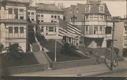 A Large Building with a Flag Out Front San Francisco, CA Postcard Postcard Postcard