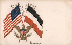 American and German flag in behind the eagle emblem Postcard