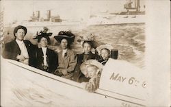 Great White Fleet in the background, with a man, 2 women, and 3 children in foreground. Postcard