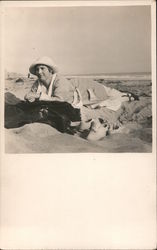 A Woman Laying in the Sand at Sea Bright Beach Postcard