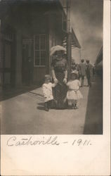 1911 Mother and Children at Depot Postcard