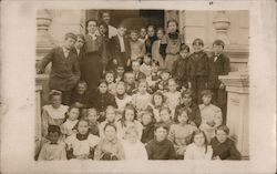 Children Sitting on Front Steps of a School House Postcard