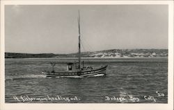 A fisherman heading out Postcard