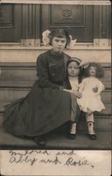 A Woman, Little Girl and a Doll on the Steps Postcard