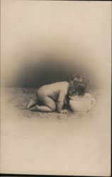 A Small Child Poking His Head in a Large Pot Babies Postcard Postcard Postcard