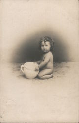 A Small Child Holding a Large Pot Babies Postcard Postcard Postcard