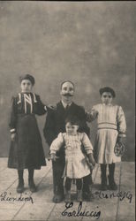 Italian Man With Mustache and Three Children Postcard