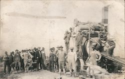 A Group of Men Standing Next to a Large Industrial Machine Postcard Postcard Postcard