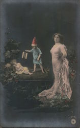 Woman With Two Children - Boy in Santa Hat Postcard