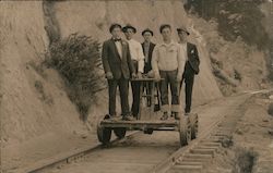 California Logging Camp - A Group of Men on a Mining Cart Postcard