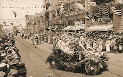 A Military Parade On A Street Full Of People and A Car Is Heavily Decorated San Diego, CA Postcard Postcard Postcard