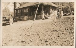 Men Next to a House Siberia, CA Postcard Postcard Postcard