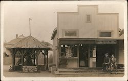 Two Men Sitting in Front of a Store Guerneville, CA Postcard Postcard Postcard