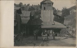 People Standing by a Mine Cart Postcard