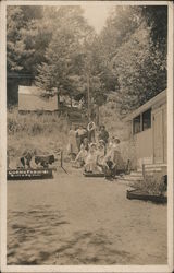 Cosmo Farm - A Group of People Posing on the Stairs Postcard