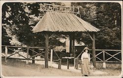 A Woman Standing at the Entrance of Summerland Guerneville, CA Postcard Postcard Postcard