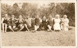 Nine People Sitting on a Log with Their Arms Around Each Other Guerneville, CA Postcard Postcard Postcard