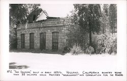 "Two Saloons," built in early 1850's. Postcard