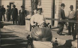 A Woman Pushing a Child in a Large Pumpkin Ventura, CA Postcard Postcard Postcard