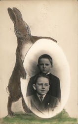 Rabbit holding an egg containing photos of 2 boys Postcard